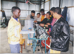 Deaf at Debre Birhan learning how to operate the weaving machine