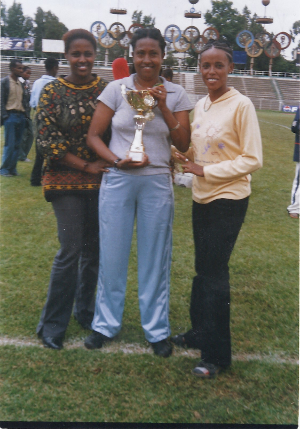 ENAD women with cup for table tennis